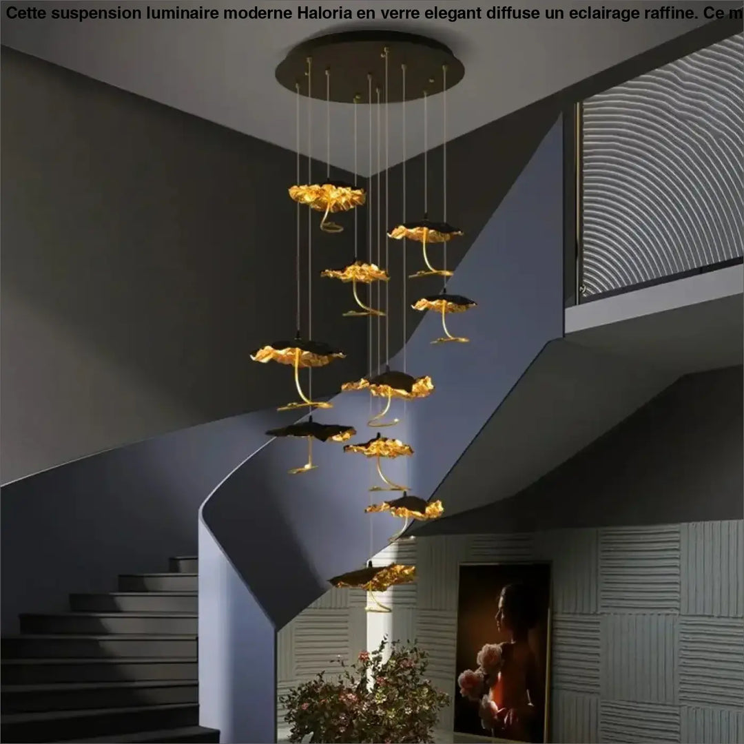 Suspension artistique feuilles sculptées noir doré élégant