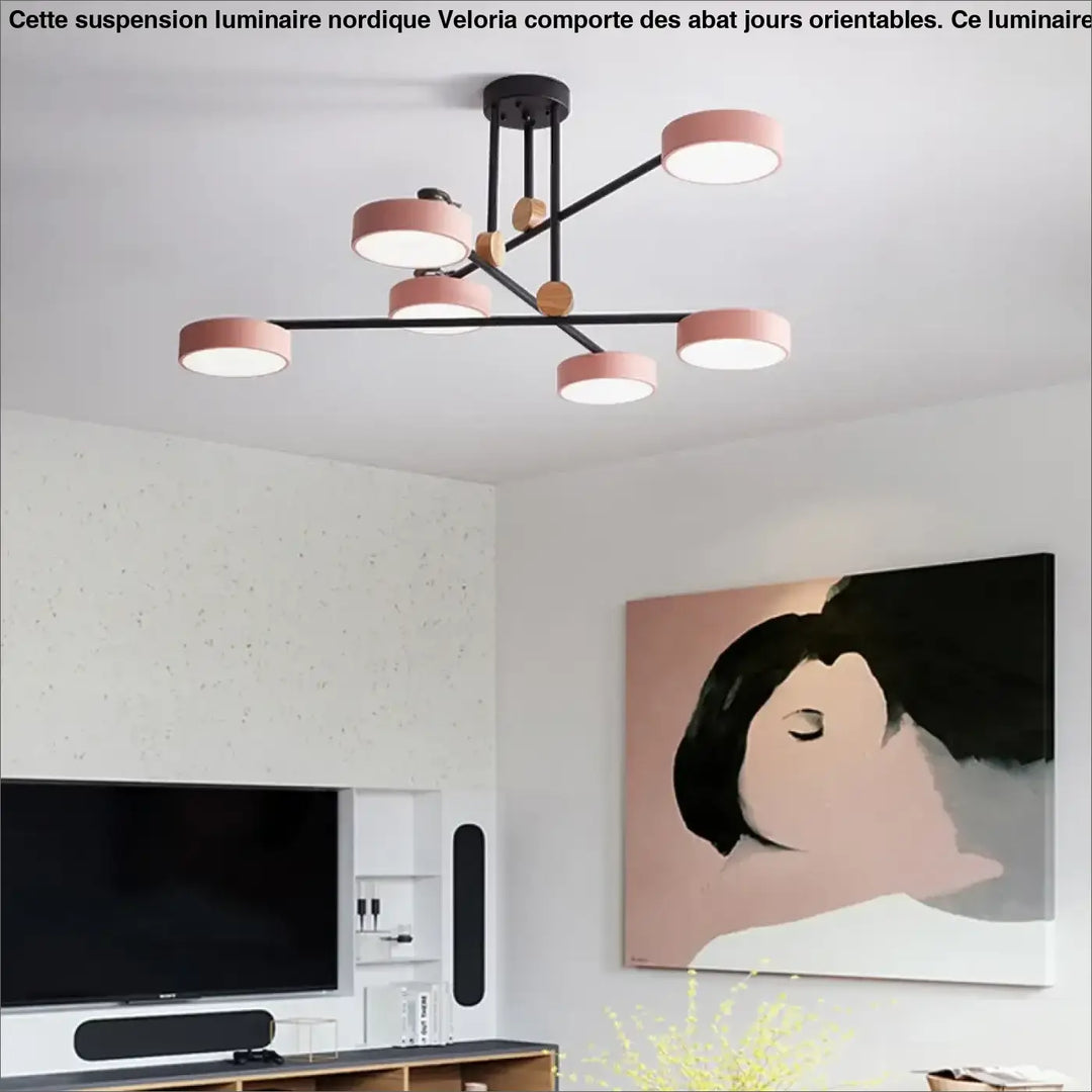Suspension luminaire nordique avec bras en métal noir, abat-jours circulaires roses et accents en bois veloria