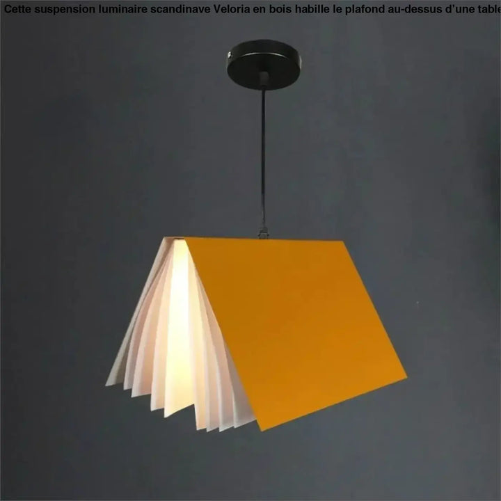Suspension luminaire boky en forme de livre ouvert jaune vibrant avec pages blanches lumineuses transformant l espace