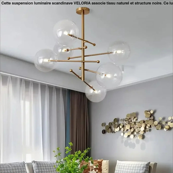 Plafonnier moderne atomix en laiton doré avec globe en verre clair pour salle à manger élégante
