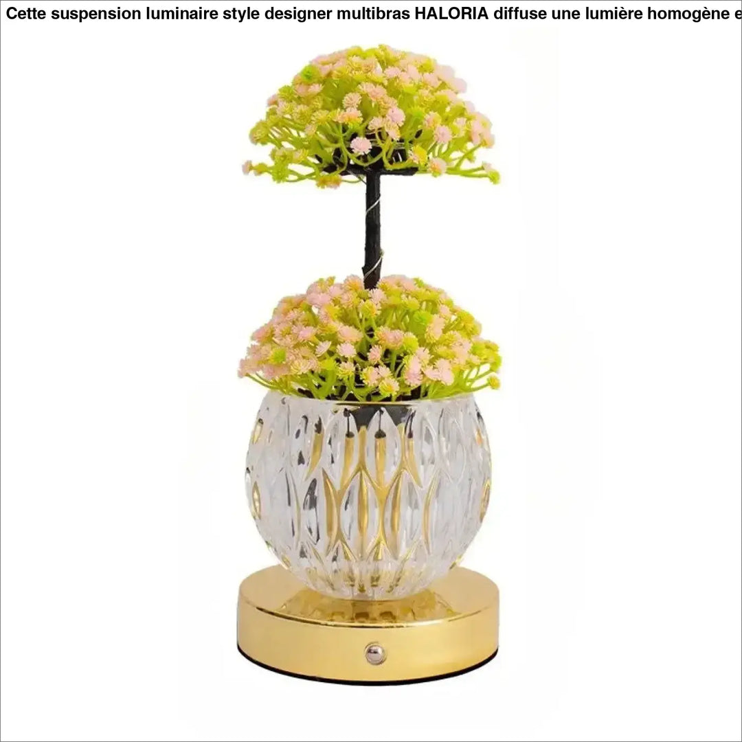 Lampe de table tulyna avec corps en verre facetté clair, garniture dorée, fleurs artificielles roses et vertes, source de lumière