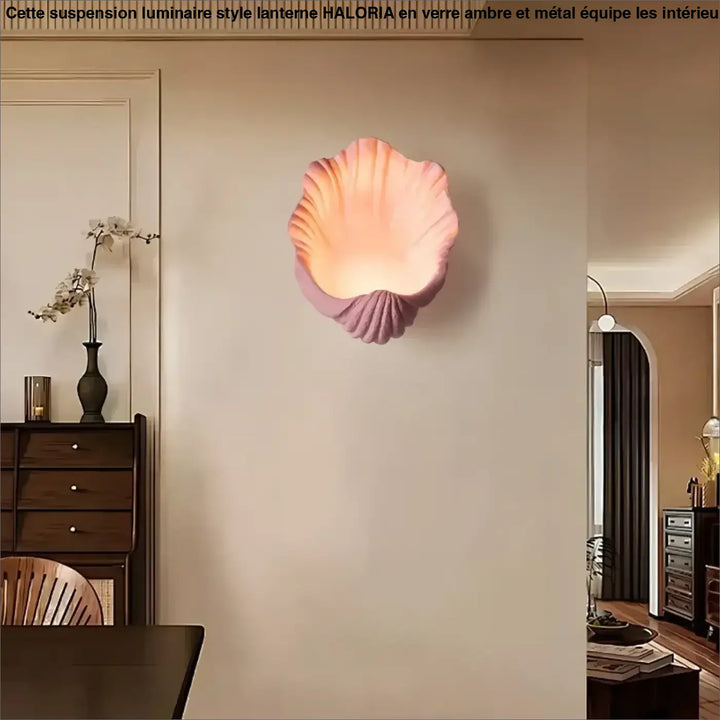 Applique murale akora en forme de coquille marine rose douce avec une lumière chaude pour un murale design élégant