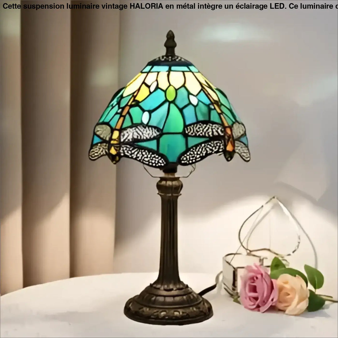 Lampe de chevet antique en verre teinté avec base bronze design vintage et motif libellule coloré devient plus élégante