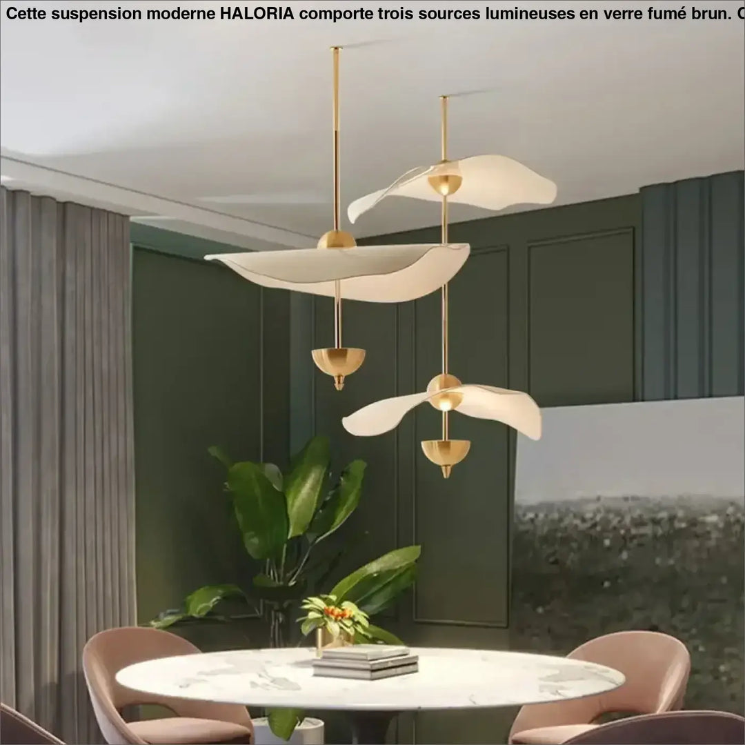 Suspension luminaire moderne dorée design aérien élégant
