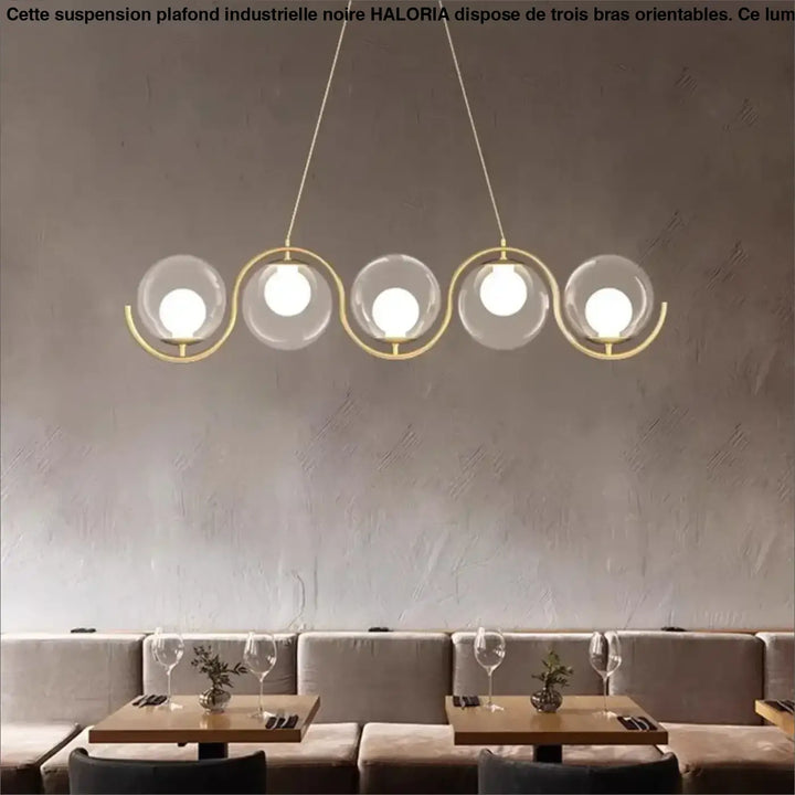 Suspension moderne vagues dorées et boules lumineuses

