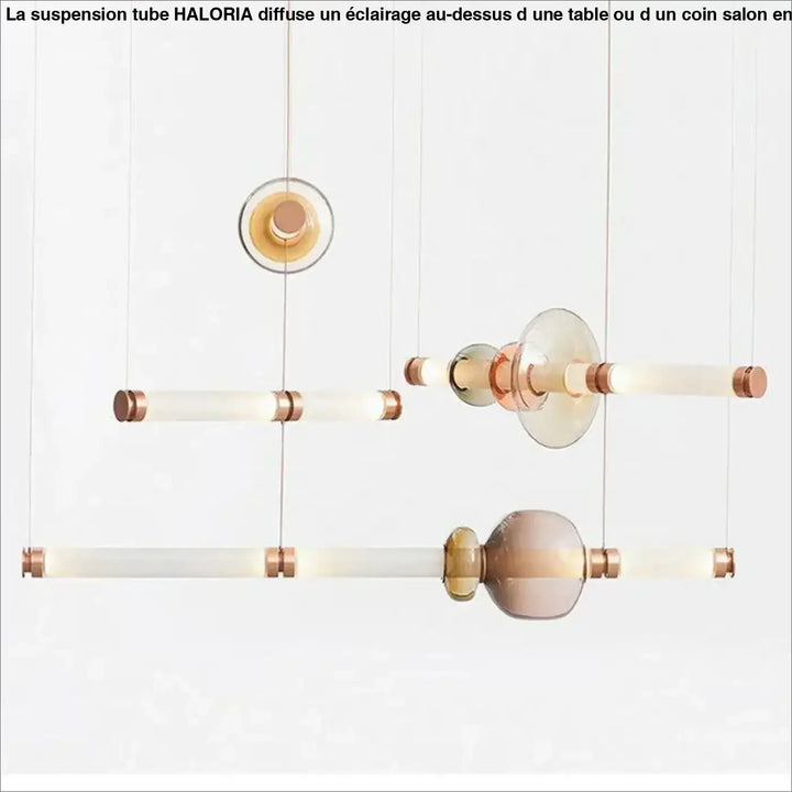Modern suspension tube haloria with frosted glass tubes and rose gold accents designed au-dessus d’une table or d’un coin salon