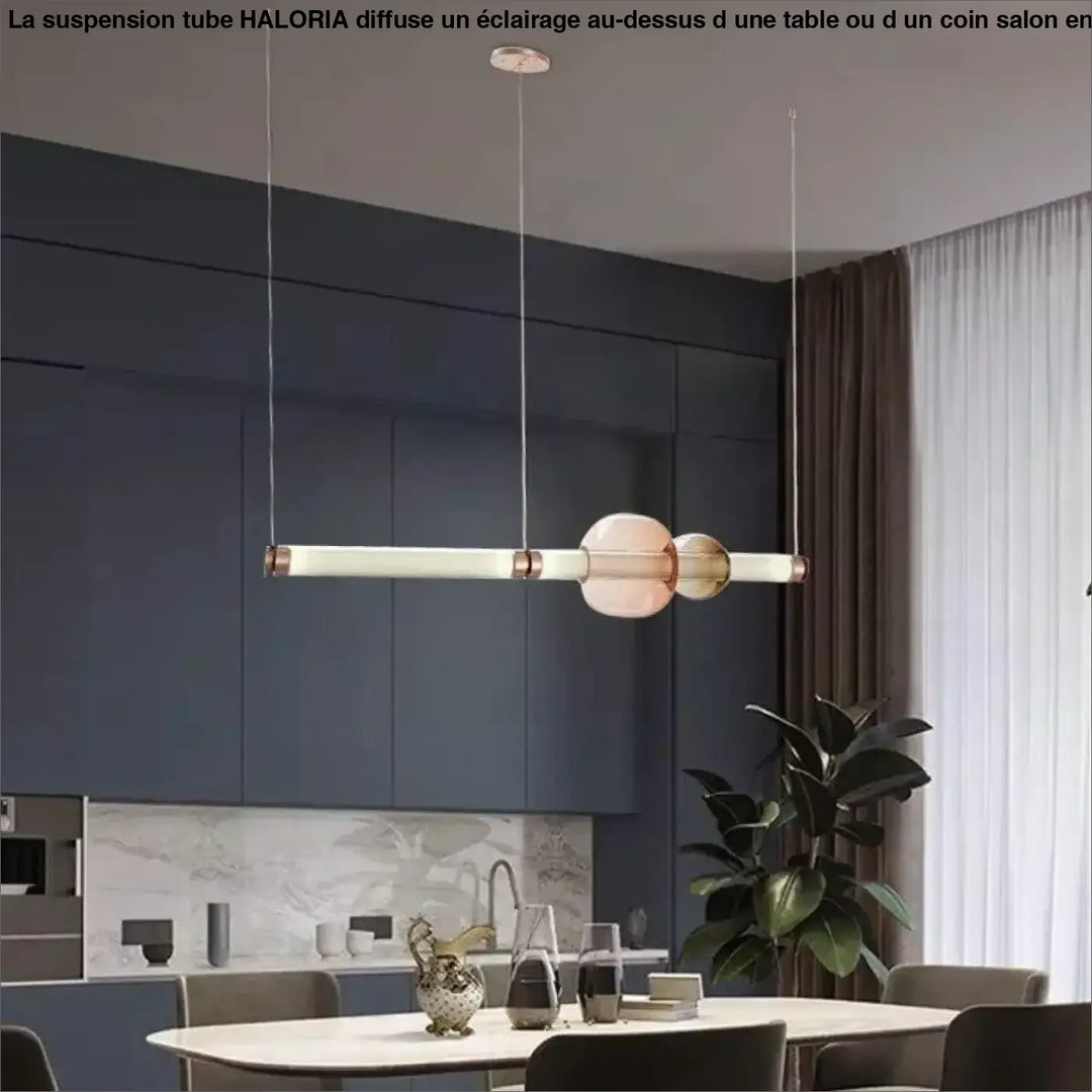 Suspension tube haloria moderne avec verre dépoli cylindrique et accents cuivre rose, idéale au-dessus d’une table ou d’un coin salon