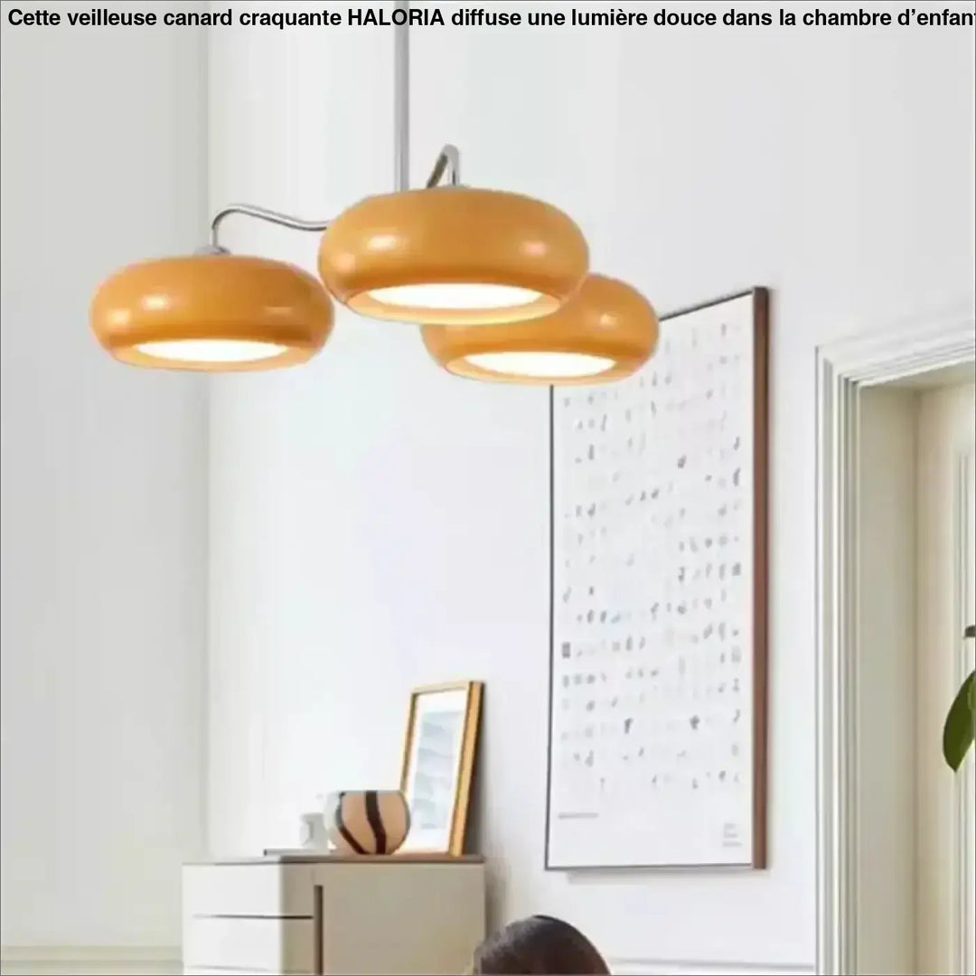 Suspension luminaire longa trois ampoules ambre avec bras métallique élégant et abat-jours en verre pour décoration intérieure design aux