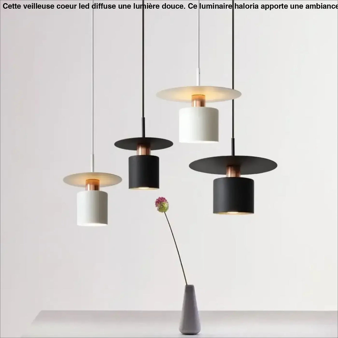 Suspension luminaire bougy moderne avec abat-jours cylindriques noirs et blancs et finitions cuivre raffiné