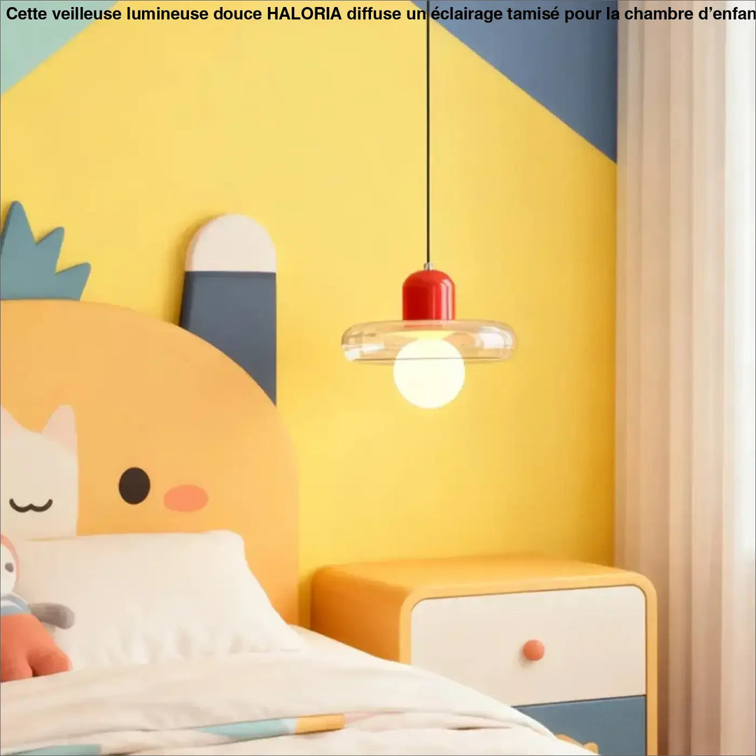 Suspension luminaire dopamine avec abat-jour cylindrique rouge et verre transparent suspendue au-dessus du lit